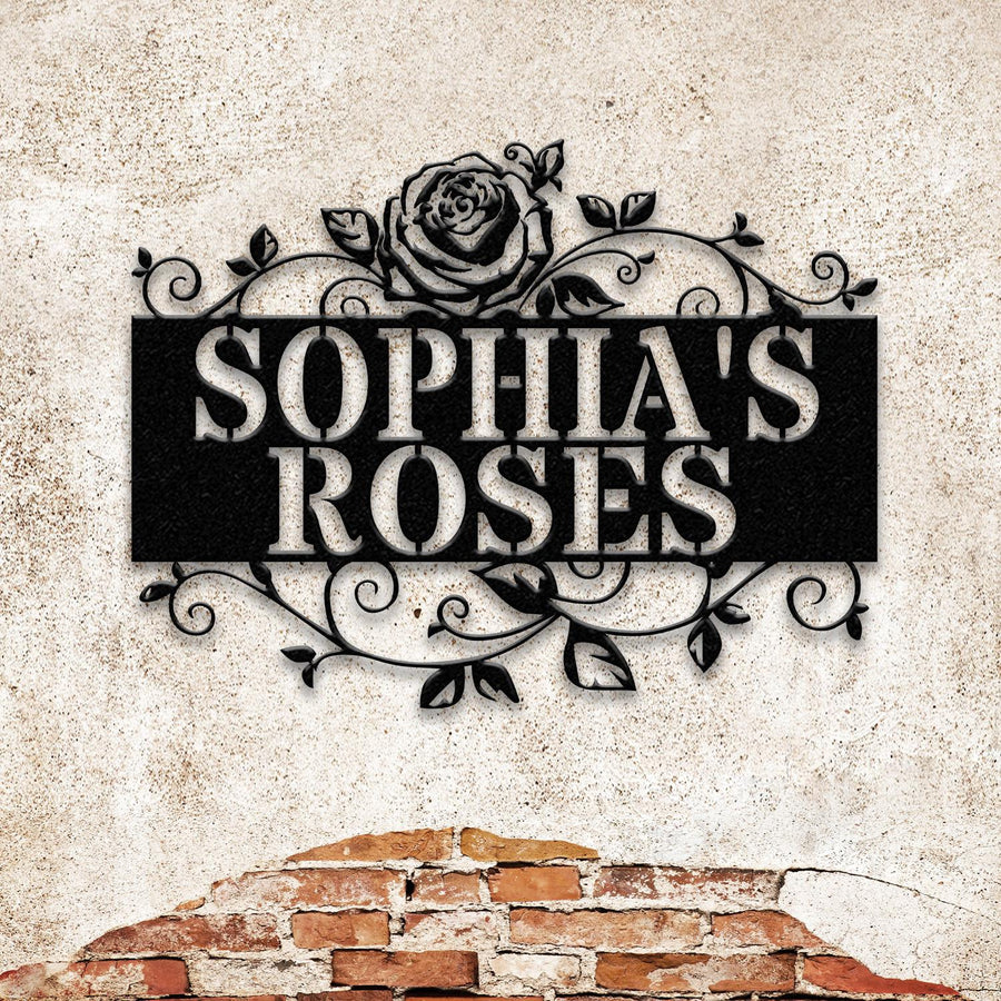 Personalized metal garden name sign mounted on a wall